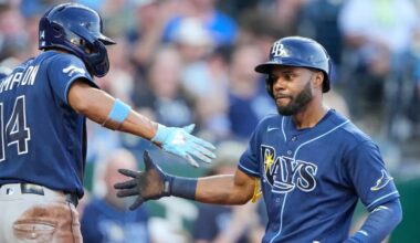 Tampa Bay Rays' Cedric Mullins, right, celebrates with Chandler Simpson (14) after hitting a two-run home run during the fifth inning of a baseball game against the Kansas City Royals, Thursday, July 2, 2026, in Kansas City, Mo. (AP Photo/Charlie Riedel)