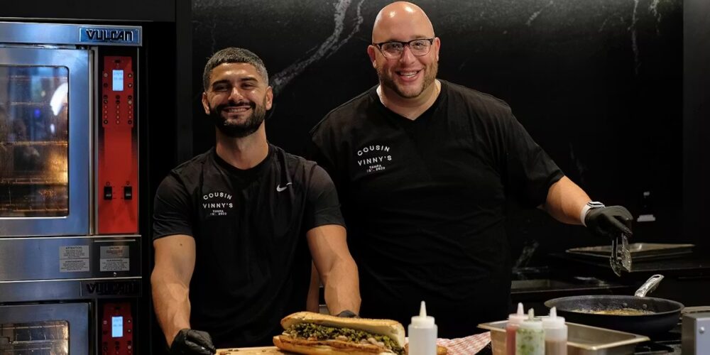 Vincent Andriotti and Russell Leone prepare food in the Cousin Vinny’s kitchen.