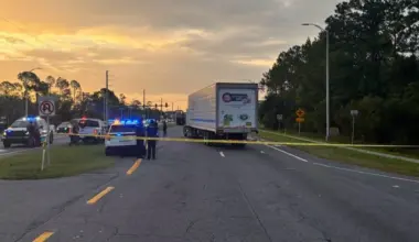 Police on the highway investigate the death of a man who was running from ICE agents.