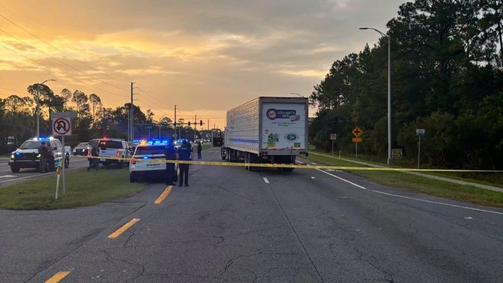 Police on the highway investigate the death of a man who was running from ICE agents.
