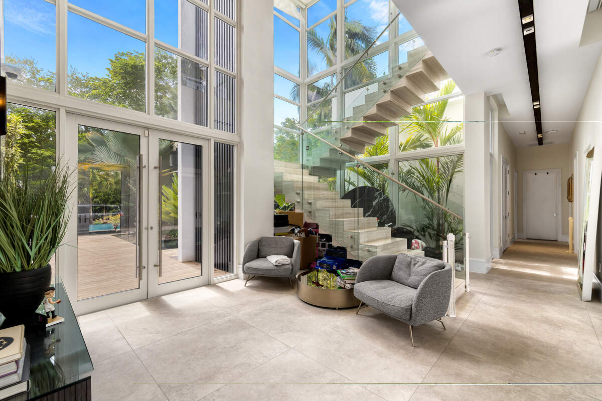 The home in Pinecrest has eight bedrooms and more than 9,000 square feet of living space.