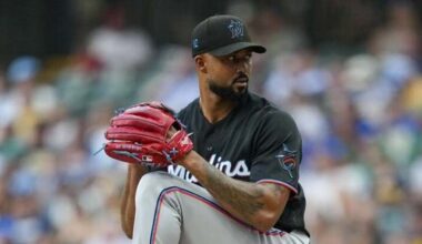 Brewers edge Marlins 2-1 in extra innings opener