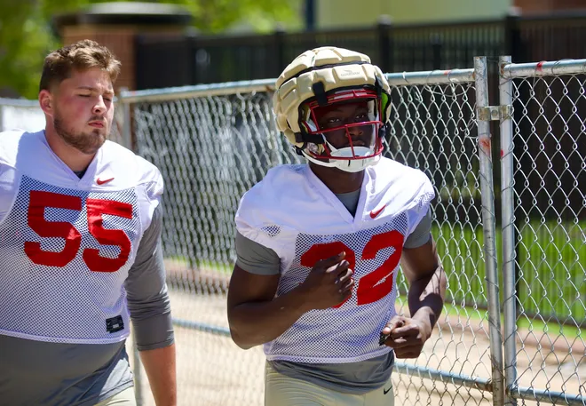 FSU football's Ousmane Kromah walks into the first practice of preseason camp on Wednesday, July 30, 2025