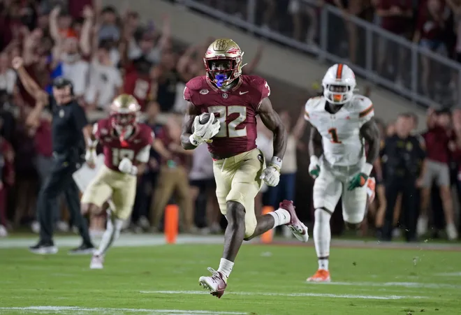 Oct 4, 2025; Tallahassee, Florida, USA; Florida State Seminoles running back Ousmane Kromah (32) runs during the first half against the Miami Hurricanes at Doak S. Campbell Stadium. Mandatory Credit: Melina Myers-Imagn Images