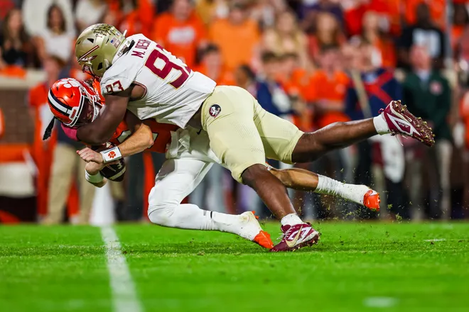 CLEMSON, SOUTH CAROLINA - NOVEMBER 08: Mandrell Desir #93 of the Florida State Seminoles sacks Cade Klubnik #2 of the Clemson Tigers during the first half of a football game at Memorial Stadium on November 08, 2025 in Clemson, South Carolina. (Photo by David Jensen/Getty Images)