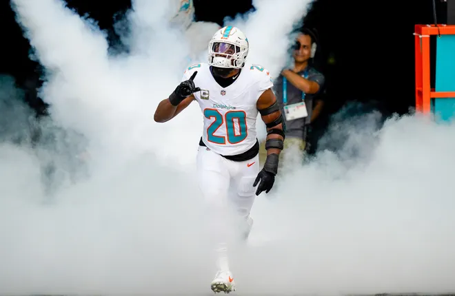 Nov 9, 2025; Miami Gardens, Florida, USA; Miami Dolphins linebacker Jordyn Brooks (20) runs on the field before a game against the Buffalo Bills at Hard Rock Stadium. Mandatory Credit: Jeff Romance-Imagn Images