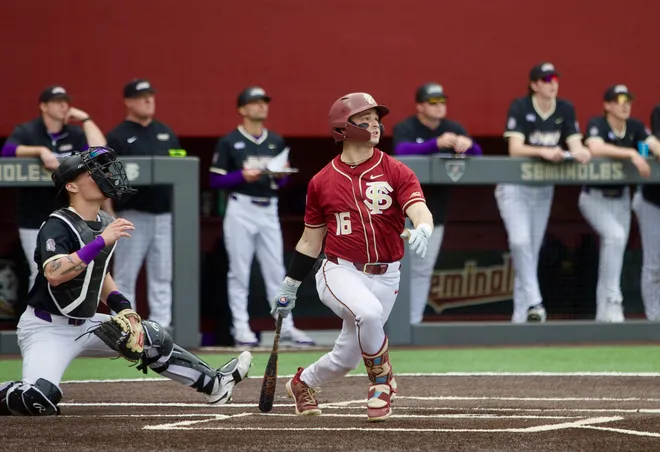 Brayden Dowd watches a home run in Florida State baseball's 16-5 win over James Madison on Saturday, Feb. 14 at Dick Howser Stadium