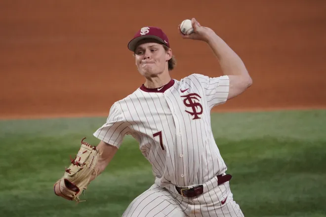 Feb 20, 2026; Arlington, TX, USA; FSU's Wes Mendes pitches against the Michigan Wolverines during the Amegy Bank College Baseball Series at Globe Life Field. Mandatory Credit: Raymond Carlin III-Imagn Images