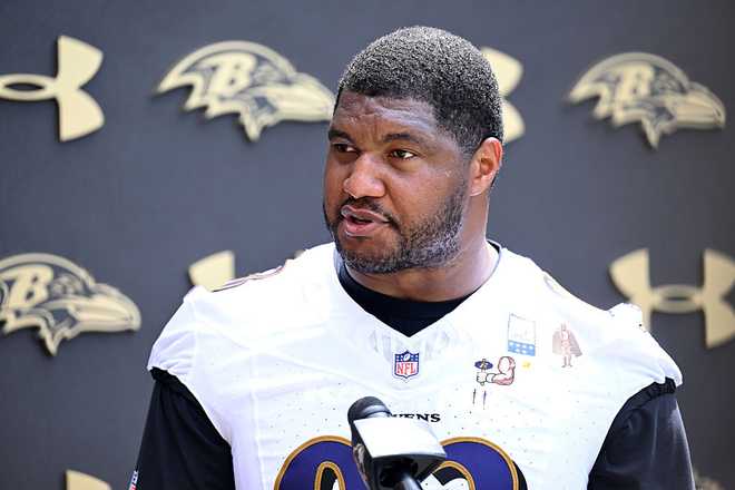 OWINGS MILLS, MARYLAND - JUNE 09:  Calais Campbell #93 of the Baltimore Ravens talks to the media after Baltimore Ravens Mandatory Minicamp at Under Armour Performance Center on June 09, 2026 in Owings Mills, Maryland. (Photo by G Fiume/Getty Images)