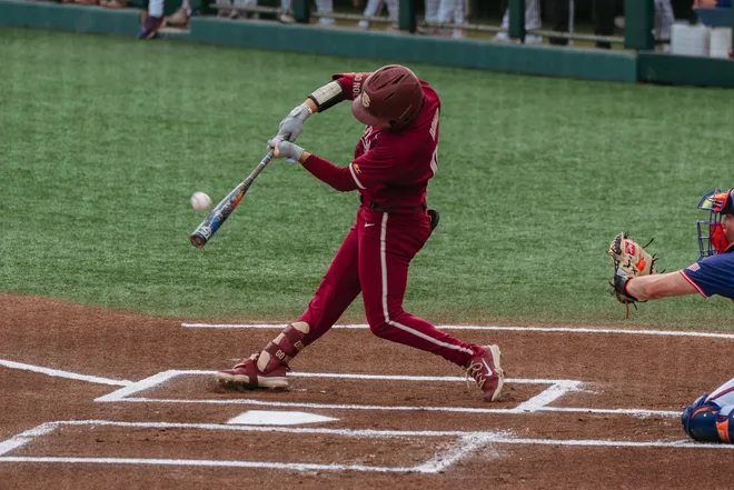 FSU baseball's Brayden Dowd hits a solo home run against Clemson on Saturday, May 9, 2026 at Doug Kingsmore Stadium.