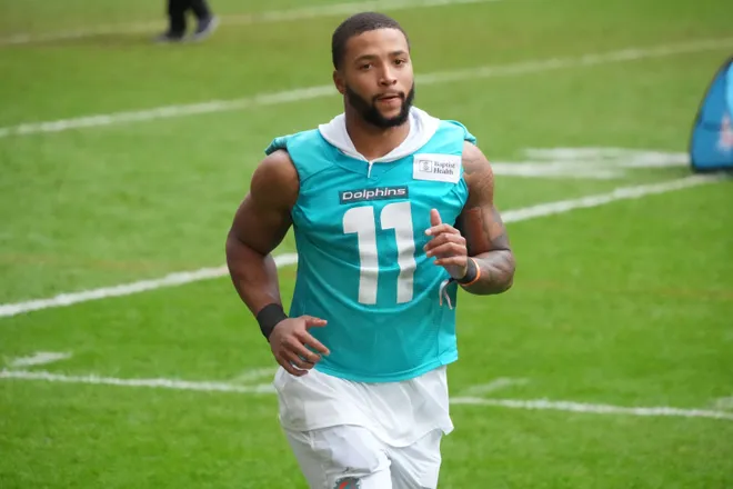 Nov 14, 2025; Madrid, Spain; Miami Dolphins safety Dante Trader Jr. (11) during practice at Estadio Riyadh Air Metropolitano. Mandatory Credit: Kirby Lee-Imagn Images