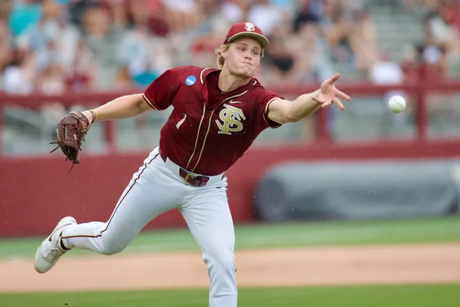 Wes Mendes tosses a ball to first base against Coastal Carolina in the NCAA Tallahassee Regional elimination game on Saturday, May 30, 2026, at Dick Howser Stadium.