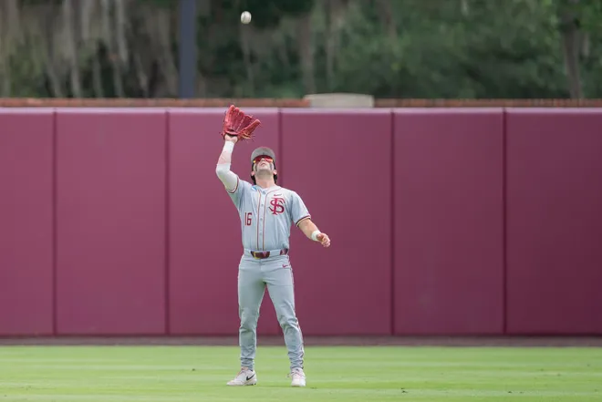 Florida State Seminoles outfielder Brayden Dowd (16) catches a fly ball. The Florida State Seminoles face the St. John's Red Storm in the Tallahassee Regional finals on Monday, June 1, 2026.
