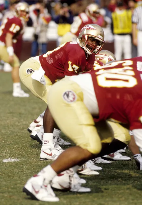 Nov 9, 1991; Tallahassee, FL, USA: FILE PHOTO; Florida State Seminoles quarterback Charlie Ward (17) calls signals at the line of scrimmage against South Carolina at Doak Campbell Stadium. FSU defeated South Carolina 38-10 Mandatory Credit: USA TODAY Sports