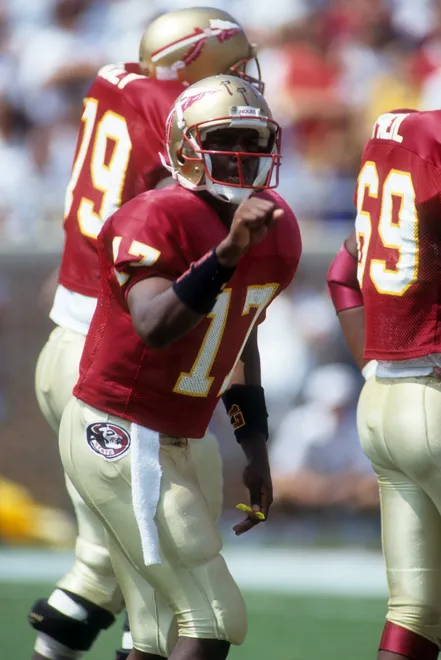 TALLAHASSEE, FL - SEPTEMBER 11: Quarterback Charlie Ward #17 of the Florida State Seminoles calls out the play during an NCAA game against the Clemson Tigers on September 11, 1993 at Doak Campbell Stadium in Tallahassee, Flroida. The Seminoles defeated the Tigers 57-0. (Photo by Scott Halleran/Getty Images)