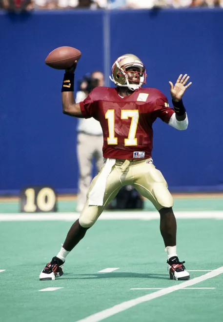 Aug 28, 1993; E.Rutherford, NJ, USA: FILE PHOTO; Florida State Seminoles quarterback Charlie Ward (17) during the game against Kansas at Giants Stadium. FSU defeated Kansas 42-0 Mandatory Credit: USA TODAY Sports