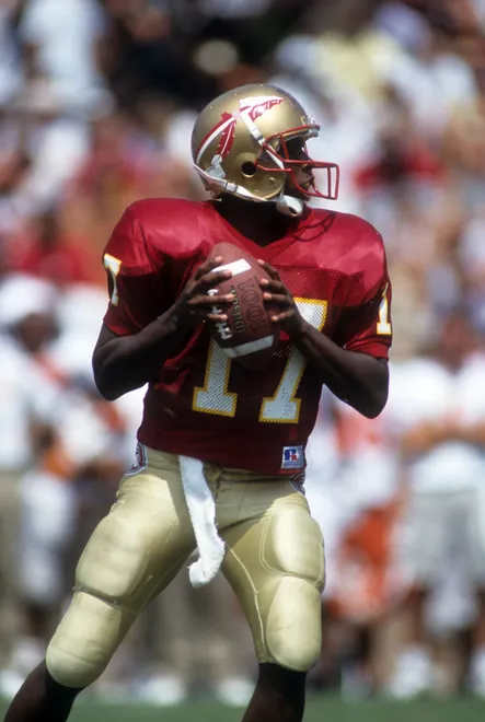 TALLAHASSEE, FL - SEPTEMBER 11: Quarterback Charlie Ward #17 of the Florida State Seminoles readies to throw the ball during an NCAA game against the Clemson Tigers on September 11, 1993 at Doak Campbell Stadium in Tallahassee, Flroida. The Seminoles defeated the Tigers 57-0. (Photo by Scott Halleran/Getty Images)