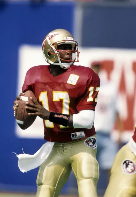 Aug 28, 1993; E.Rutherford, NJ, USA: FILE PHOTO; Florida State Seminoles quarterback Charlie Ward (17) during the game against Kansas at Giants Stadium. FSU defeated Kansas 42-0 Mandatory Credit: USA TODAY Sports