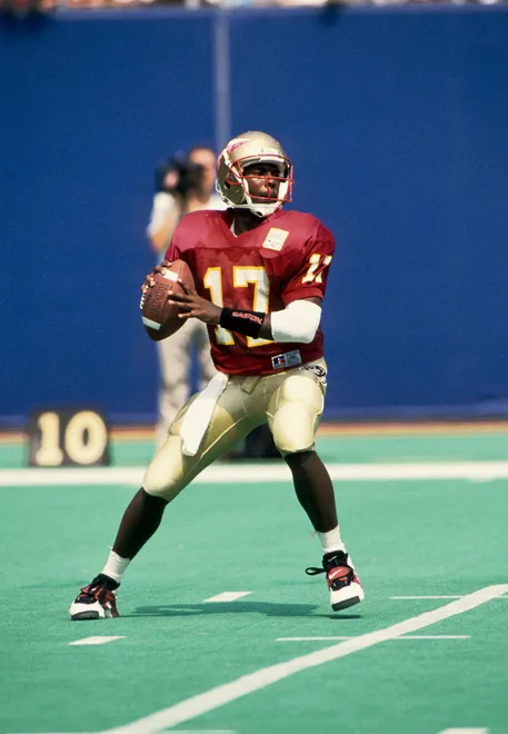 Aug 28, 1993; E.Rutherford, NJ, USA: FILE PHOTO; Florida State Seminoles quarterback Charlie Ward (17) during the game against Kansas at Giants Stadium. FSU defeated Kansas 42-0 Mandatory Credit: USA TODAY Sports