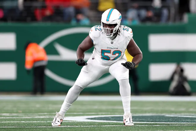EAST RUTHERFORD, NEW JERSEY - JANUARY 05: Patrick Paul #52 of the Miami Dolphins in action against the New York Jets at MetLife Stadium on January 05, 2025 in East Rutherford, New Jersey. (Photo by Luke Hales/Getty Images)