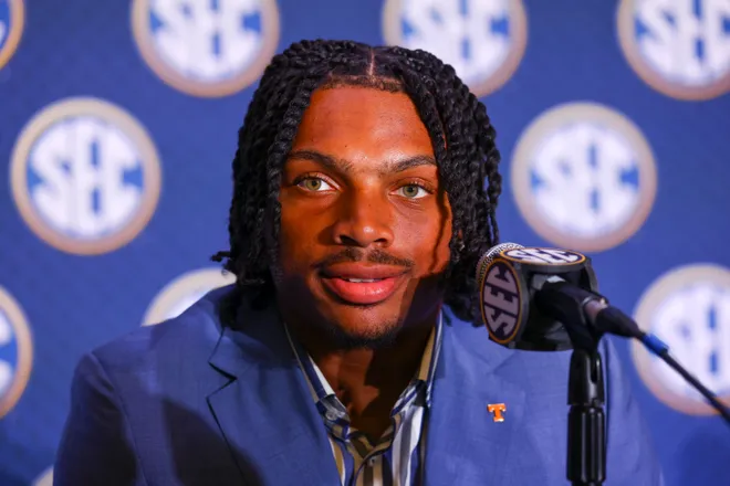 July 20, 2026; Tampa, Florida; Tennessee Volunteers running back DeSean Bishop (18) speaks to the press during SEC football kickoff media day at the Tampa Marriott.