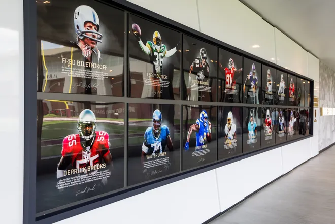 Florida State players who went on to play in the NFL are displayed on a wall inside the Florida State University Dunlap Football Center.