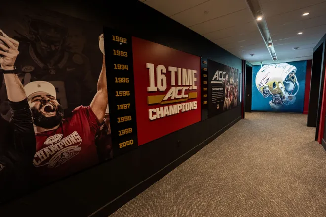 The years that Florida State won the ACC championship is displayed on a wall inside the Florida State University Dunlap Football Center.