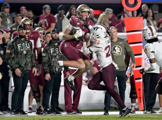 Nov 15, 2025; Tallahassee, Florida, USA; Florida State Seminoles wide receiver Duce Robinson (0) catches a pass during the second half against the Virginia Tech Hokies at Doak S. Campbell Stadium. Mandatory Credit: Melina Myers-Imagn Images