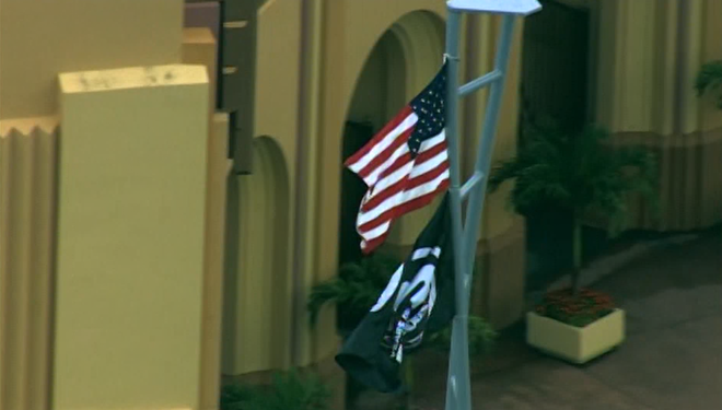 American flag raised atop 'Fast and Furious' coaster at Universal Studios Florida american flag raised atop 'fast and furious' coaster at universal studios florida