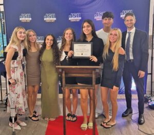 Palm Harbor University High JSU students receive JSU New Club of the Year› award.