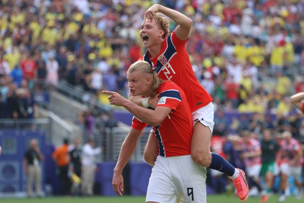 Norway's Erling Haaland celebrates with Andreas Schjelderup (21) after scoring their second goal during the World Cup against Brazil in East Rutherford, N.J., on July 5, 2026. (AP Photo/Pamela Smith)