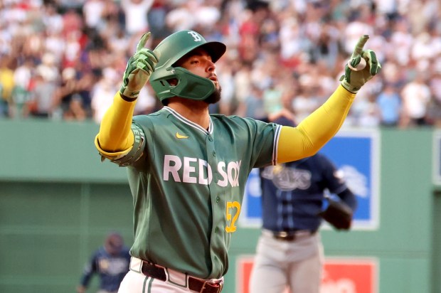 Boston Red Sox's Wilyer Abreu gestures after scoring a home run during the first inning of the second game of a doubleheader against the Tampa Bay Rays, Friday, July 17, 2026, in Boston. (AP Photo/Mark Stockwell)