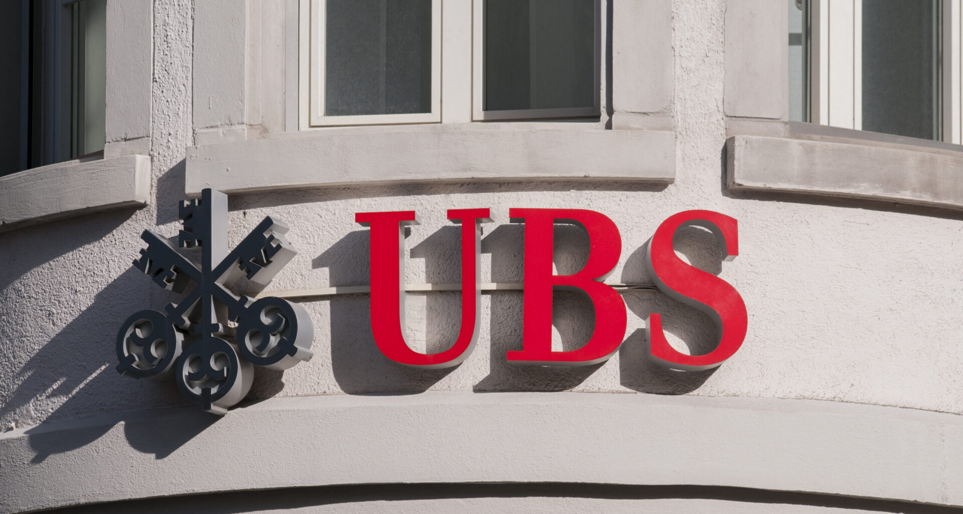UBS sign displayed on the exterior of a building