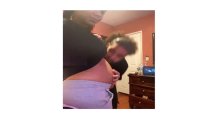 Photo from Nov. 2024 of Leon kissing and holding Feliz's apparent pregnant belly.