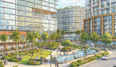 Rendering of the proposed mixed-use redevelopment at Stetson University's Tampa Law Center site, showing a new law center surrounded by residential, office, retail and public green space.