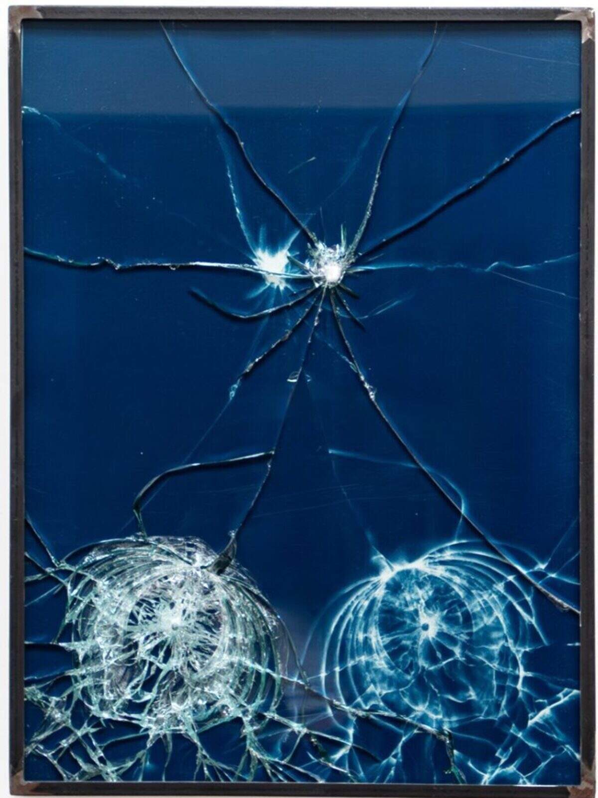 Antonia Wright, “OK,” 2026, cyanotype, broken glass, artist steel frame.