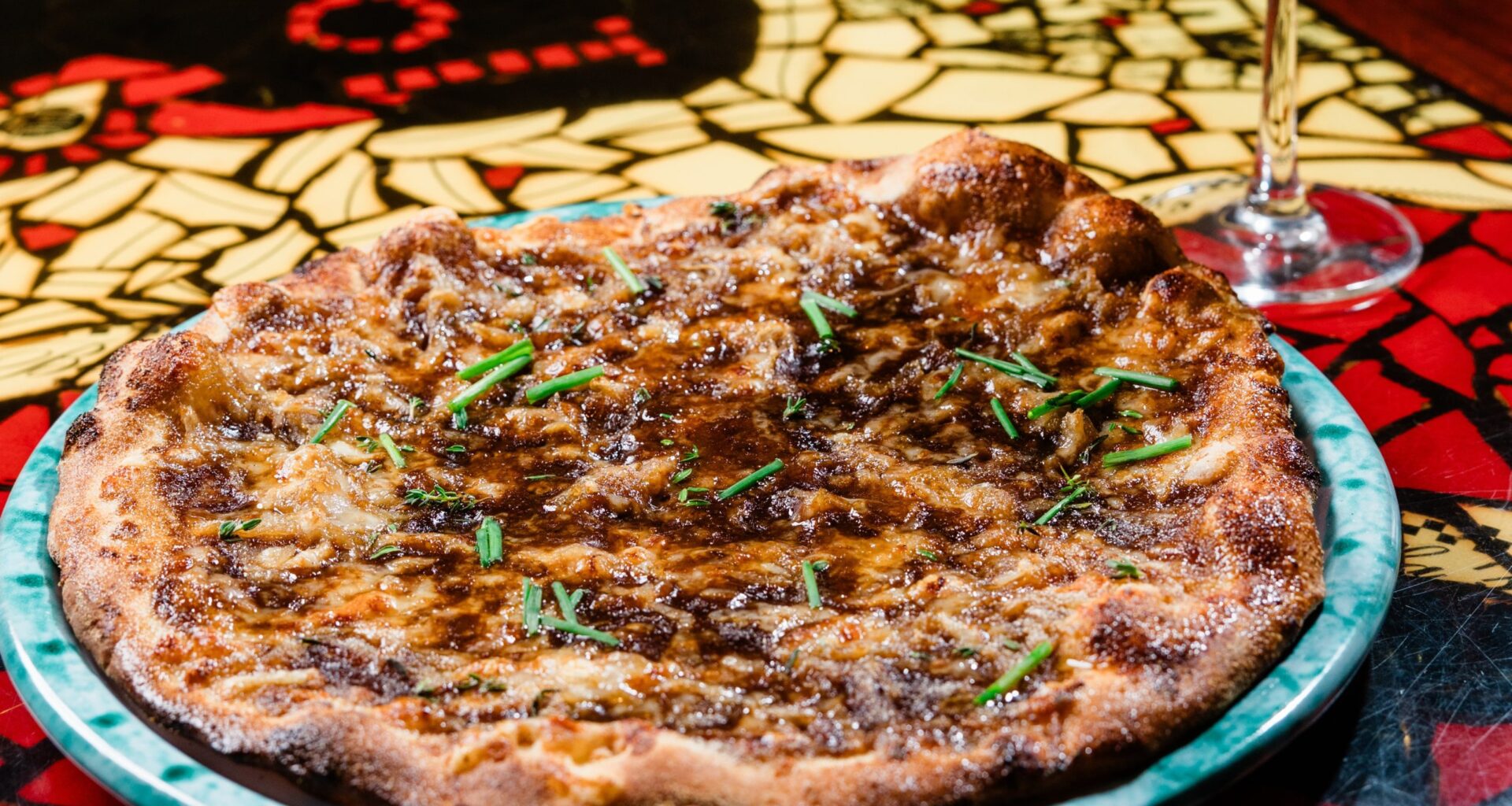 Tampa icons Bern's Steak House and Bella's Italian Cafe now have a limited-time French onion pizza 
