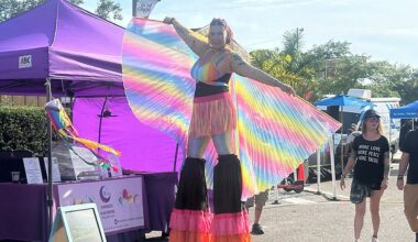 A woman dressed in rainbow colors walks on stilts during this year's St. Pete Pride street fair on May 29.