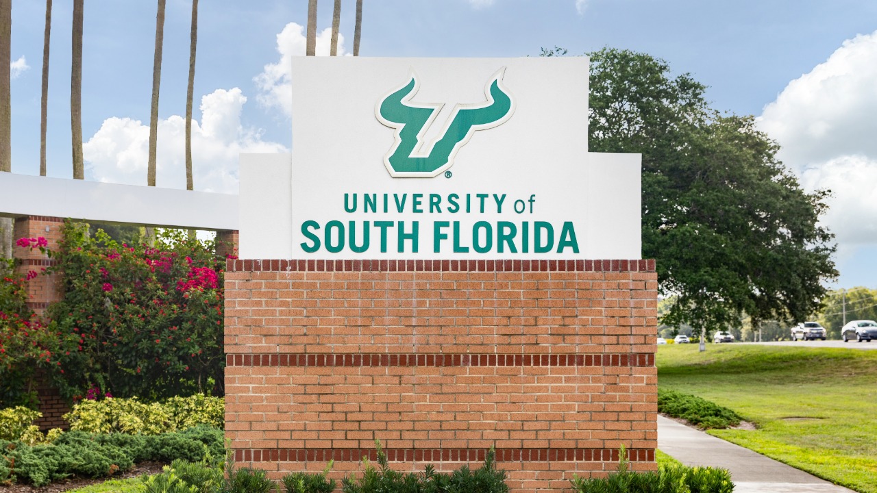 Entrance sign for the University of South Florida's Tampa campus, where ReliaQuest is investing $1.5 million to expand artificial intelligence and cybersecurity research and workforce training.