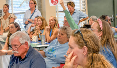 Residents pack the room at the July 16 meeting at Hyde Grove Elementary School, many of them in opposition to the proposed plans.