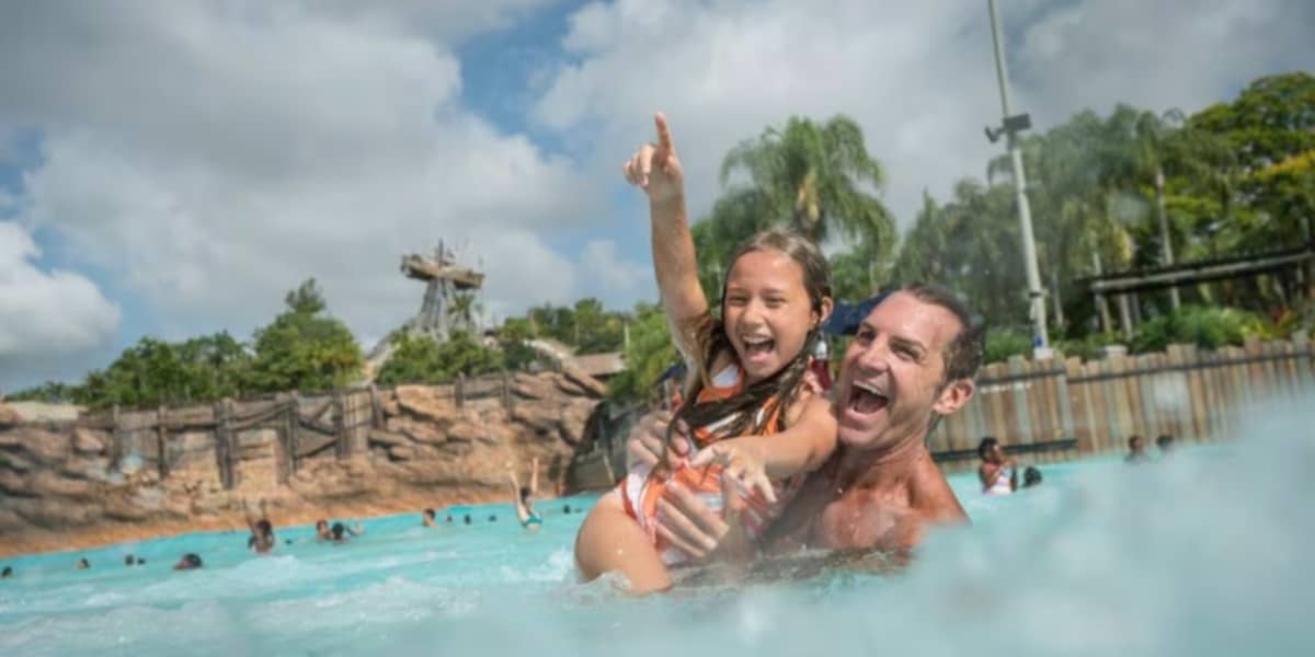 Guests enjoying the wave pool at Typhoon Lagoon