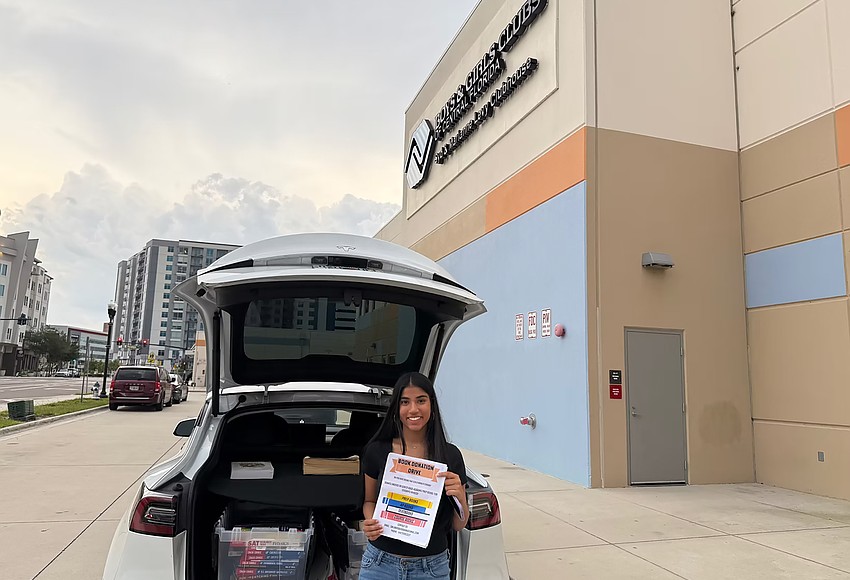 Read it forward: Windermere student launches book bank