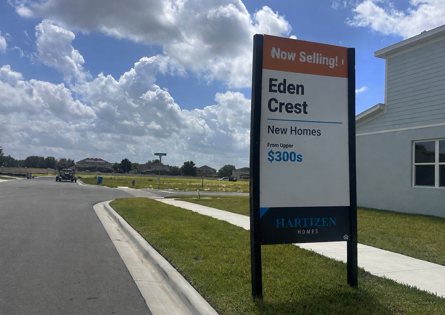 A sign advertises new homes at Eden Crest, one of several development-related items scheduled for review at the July 8 Development Review Committee meeting.