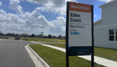 A sign advertises new homes at Eden Crest, one of several development-related items scheduled for review at the July 8 Development Review Committee meeting.