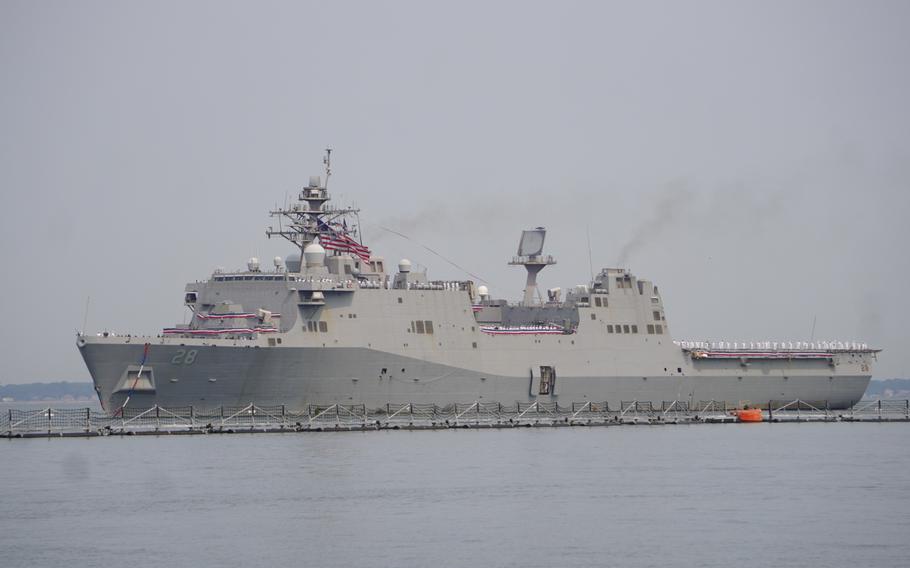 A ship transits the water.
