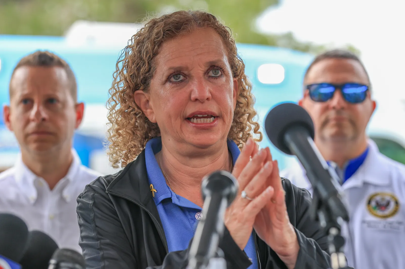 Rep. Debbie Wasserman Schultz (D-FL), Rep. Jared Moskowitz (D-FL) (L), and Rep. Darren Soto (D-FL) during a press conference after visiting "Alligator Alcatraz" at the Dade-Collier Training and Transition Airport on July 12, 2025, in Ochopee, Florida. (Photo by Joe Raedle/Getty Images)