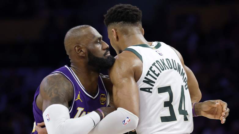LeBron James embraces Giannis Antetokounmpo after an NBA game between the Los Angeles Lakers and Milwaukee Bucks.