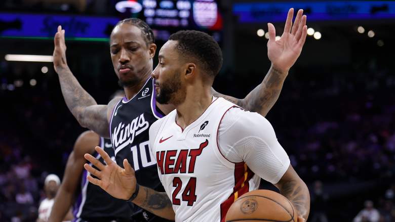 DeMar DeRozan guards Norman Powell during an NBA game between the Sacramento Kings and Miami Heat.