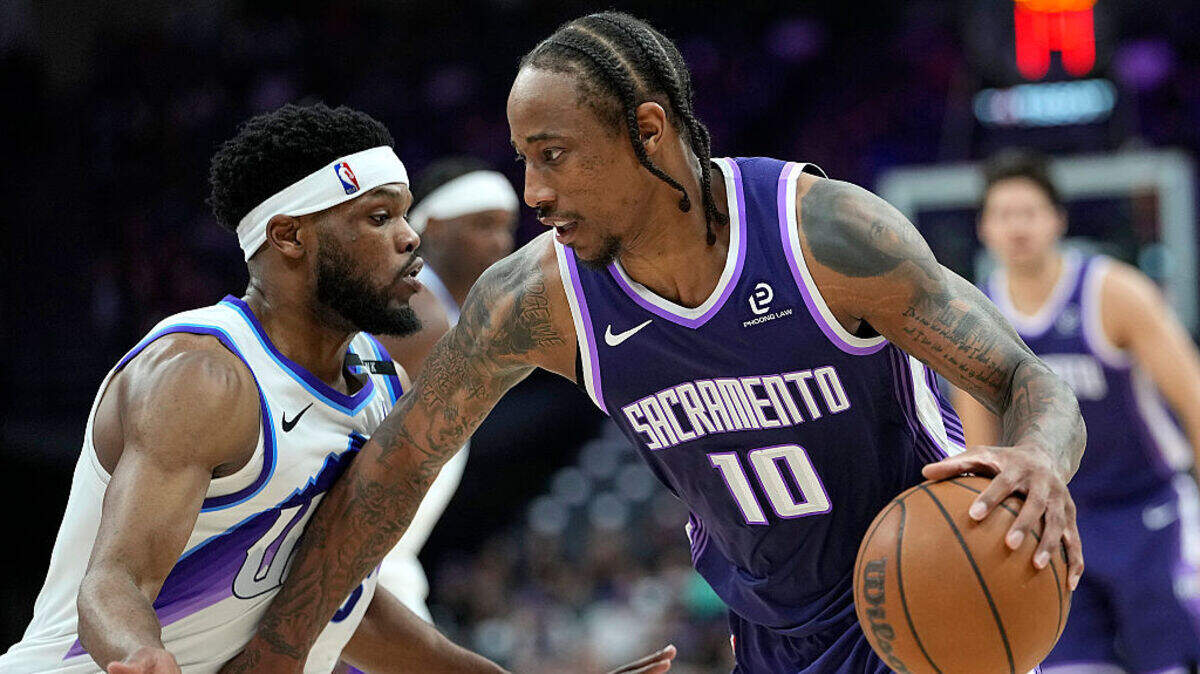 DeMar DeRozan #10 of the Sacramento Kings dribbling the ball is guarded by Elijah Harkless #16 of the Utah Jazz in the second half at Golden 1 Center on March 15, 2026 in Sacramento, California. DeMar DeRozan #10 of the Sacramento Kings dribbling the ball is guarded by Elijah Harkless #16 of the Utah Jazz in the second half at Golden 1 Center on March 15, 2026 in Sacramento, California.