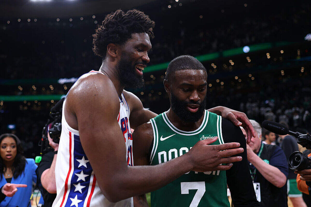 Joel Embiid #21 of the Philadelphia 76ers and Jaylen Brown #7 of the Boston Celtics embrace after the 76ers defeated the Celtics 109-100 in Game Seven of the First Round of the NBA Eastern Conference Playoffs at TD Garden on May 02, 2026 in Boston.